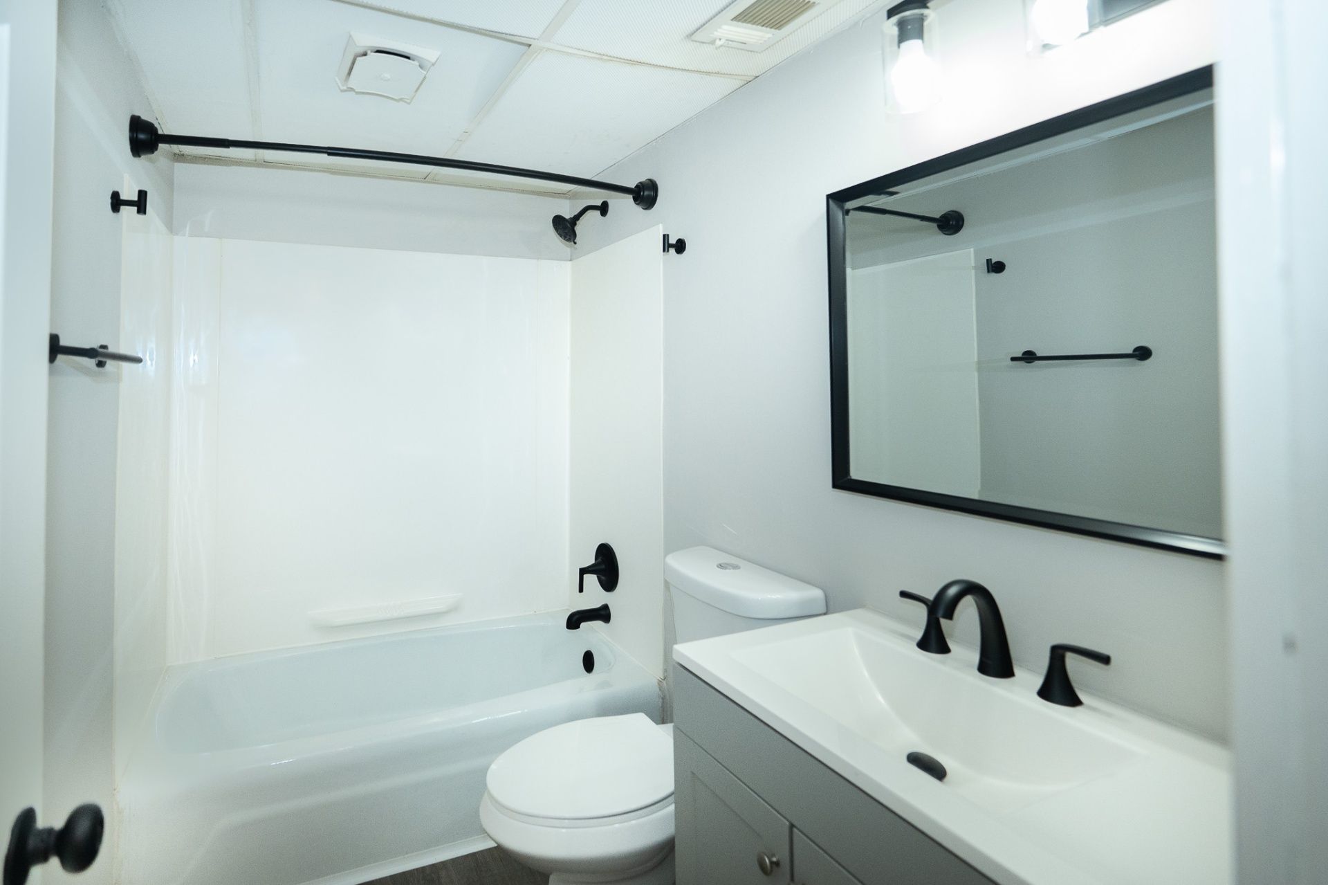 Updated bathroom with new fixtures and vanity